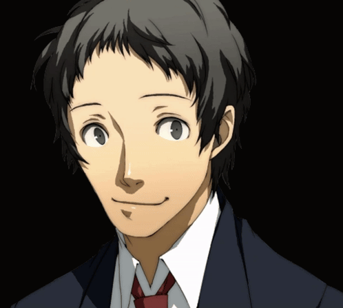 A Man Wearing A Suit And Tie Is Smiling GIF
