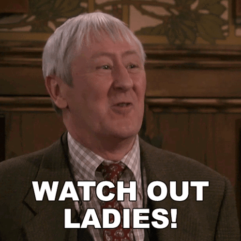 A Man Wearing A Suit And Tie Says Watch Out Ladies GIF