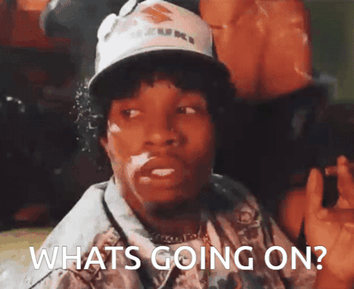 A Man Wearing A Suzuki Hat Says " Whats Going On " GIF