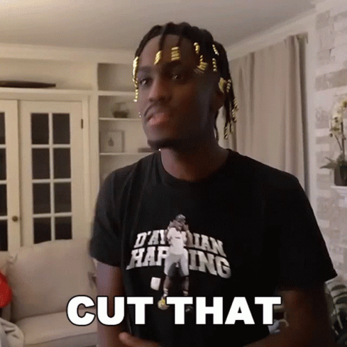 A Man Wearing A T-Shirt That Says ' Cut That ' On It GIF