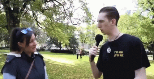 A Man Wearing A T-Shirt That Says I 'M And Stop Me GIF