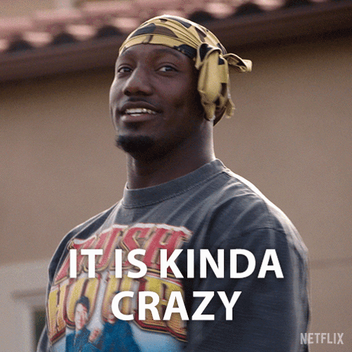 A Man Wearing A T-Shirt That Says It Is Kinda Crazy On It GIF