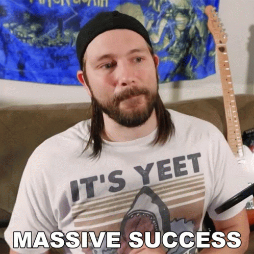 A Man Wearing A T-Shirt That Says It 'S Yeet GIF