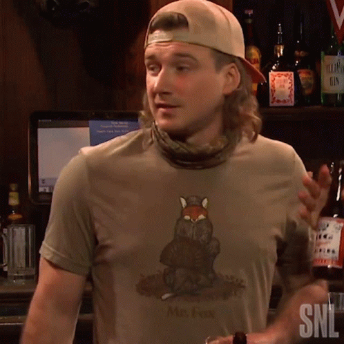 A Man Wearing A T-Shirt That Says Mrs. Fox GIF