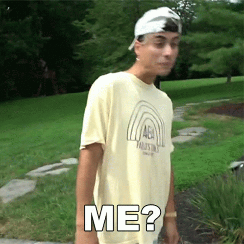 A Man Wearing A T-Shirt With A Rainbow On It And The Word Me On It GIF