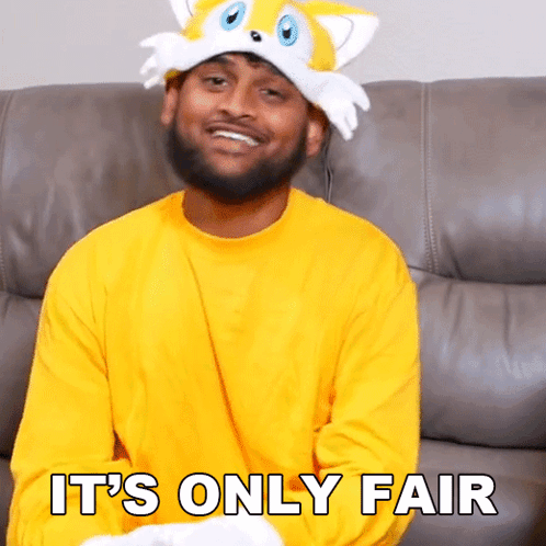 A Man Wearing A Tails Hat Is Sitting On A Couch With The Words It 'S Only Fair Below Him GIF