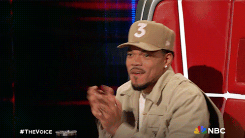 A Man Wearing A Tan Hat With The Number 3 On It GIF