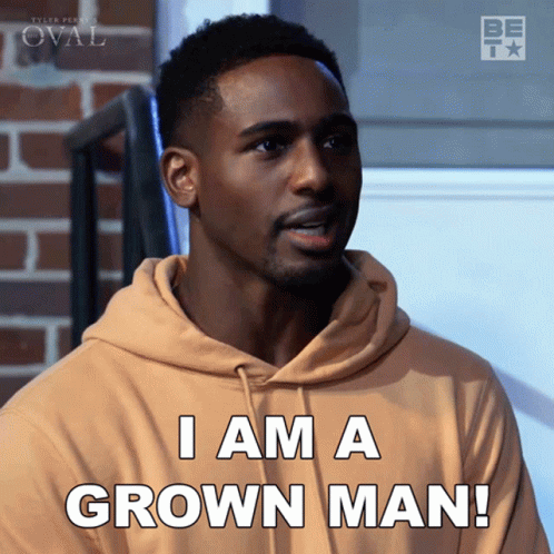 A Man Wearing A Tan Hoodie Says I Am A Grown Man GIF
