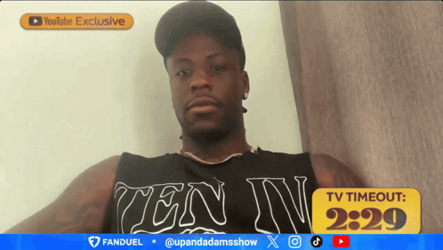A Man Wearing A Tank Top That Says Ten Iv On It GIF