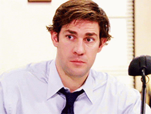 A Man Wearing A Tie And A White Shirt GIF