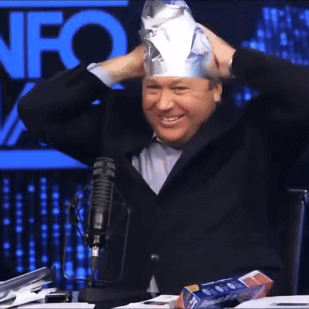 A Man Wearing A Tin Foil Hat In Front Of A Fox Logo GIF