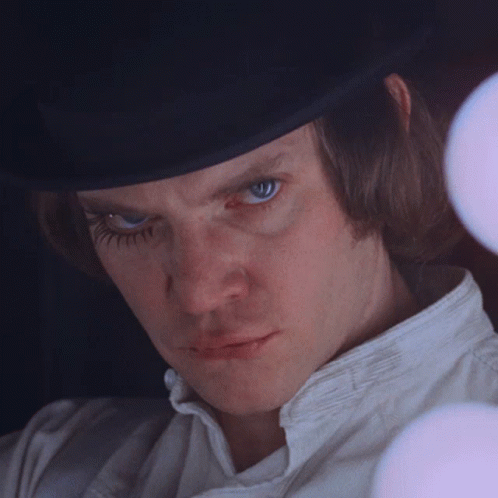 A Man Wearing A Top Hat And A White Shirt GIF