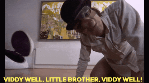 A Man Wearing A Top Hat And Goggles Says Viddy Well Little Brother GIF