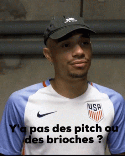 A Man Wearing A Usa Shirt And A Hat GIF
