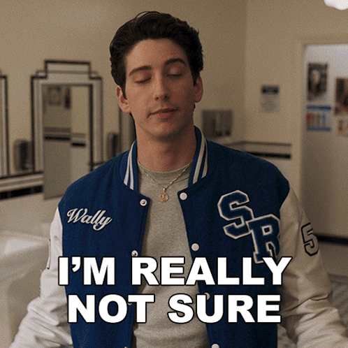 A Man Wearing A Varsity Jacket That Says Wally On It GIF