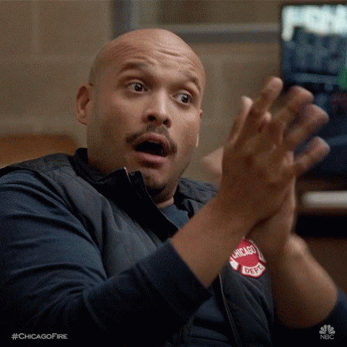A Man Wearing A Vest That Says Chicago Dept On It GIF