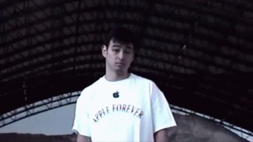 A Man Wearing A White Apple Forever Shirt GIF
