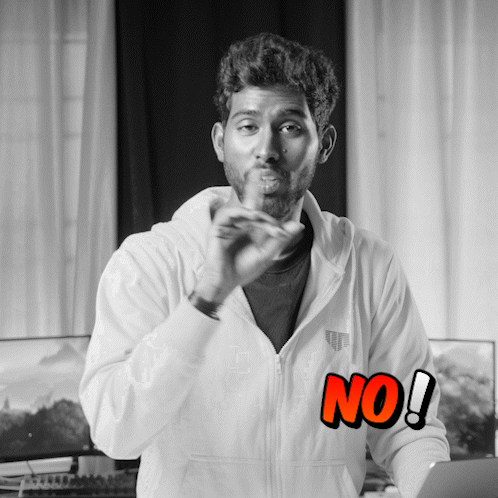 A Man Wearing A White Hoodie With The Word No Written On It GIF