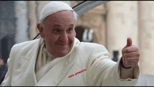 A Man Wearing A White Jacket That Says Pope Approved GIF