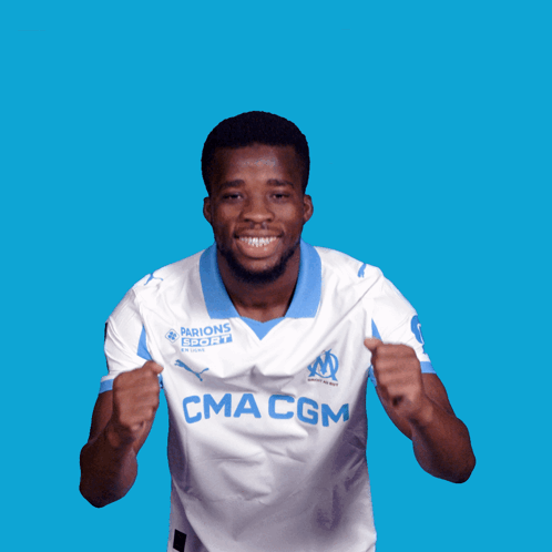 a man wearing a white jersey that says cma cgm on it