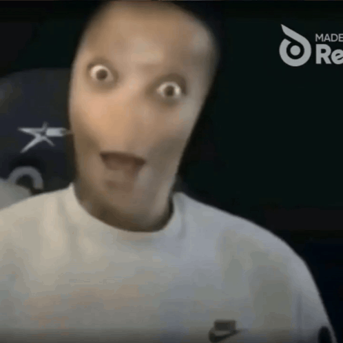A Man Wearing A White Nike Sweatshirt Looks Surprised GIF