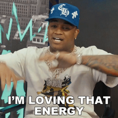 A Man Wearing A White Shirt And A Blue Hat Is Saying I 'M Loving That Energy GIF