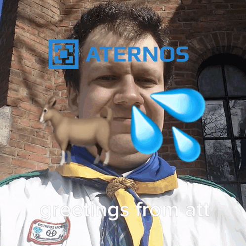 A Man Wearing A White Shirt And A Blue Scarf With Greetings From Att On The Bottom GIF