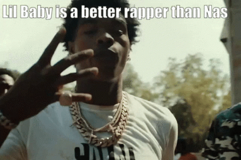A Man Wearing A White Shirt And A Gold Chain Is Making A Funny Face . GIF