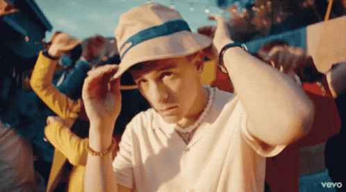 Man In White Shirt And Vevo Hat GIF