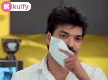 A Man Wearing A White Shirt And A White Face Mask GIF
