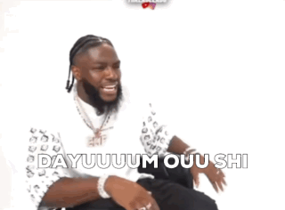 A Man Wearing A White Shirt And Black Pants Has The Words Dayuum Ouu Shi On The Bottom Of His Pants GIF