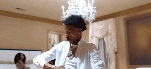 A Man Wearing A White Shirt That Says A & T On It GIF