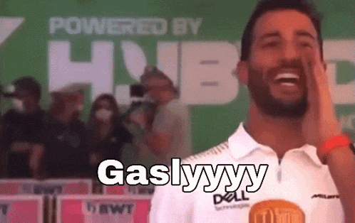 A Man Wearing A White Shirt That Says Gaslyyyy On It GIF
