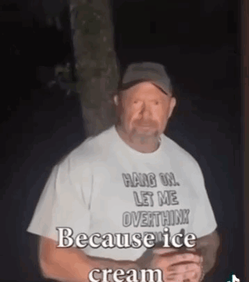A Man Wearing A White Shirt That Says `` Hang On , Let Me Overthink Because Ice Cream '' GIF