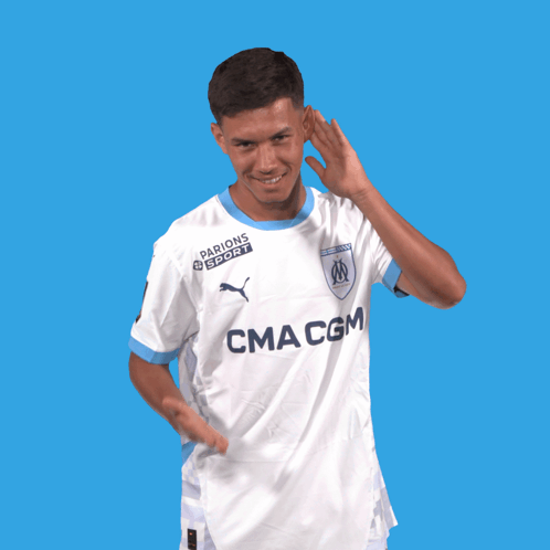 A Man Wearing A White Shirt With Cma Cgm On The Front GIF
