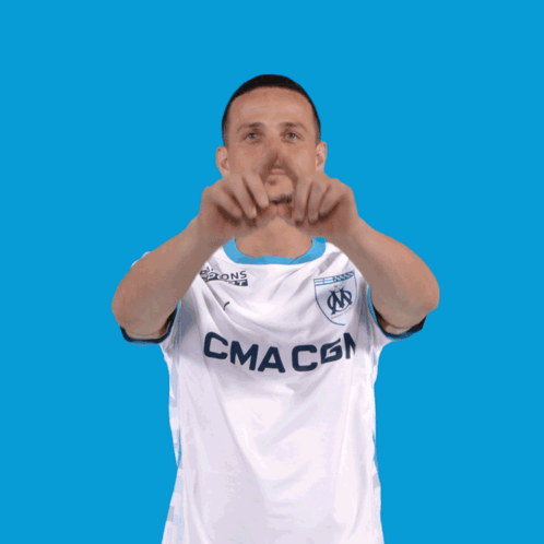 A Man Wearing A White Shirt With Cma Cgm Written On It GIF