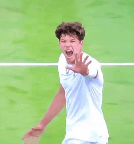 A Man Wearing A White Shirt With The Letter Oc On The Front GIF
