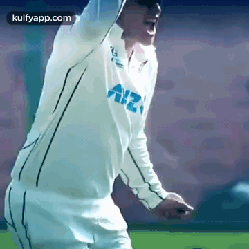 A Man Wearing A White Shirt With The Word Allianz On It GIF