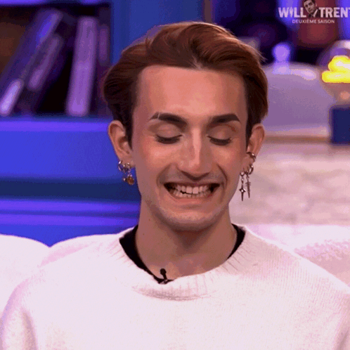 Man In White Sweater Earrings Smiling Will & Tren GIF