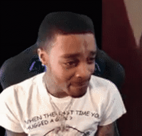 A Man Wearing A White T-Shirt That Says When The Last Time You Hugged A Girl GIF