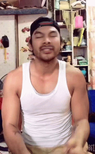 Man With White Tank Top And B61 Number GIF