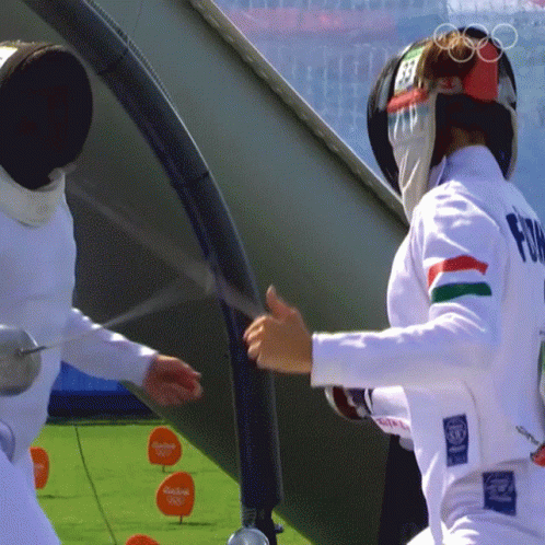 A Man Wearing A White Uniform With The Word Fia On It GIF