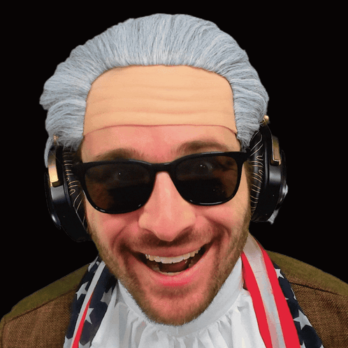 A Man Wearing A Wig And Sunglasses Has Headphones On GIF