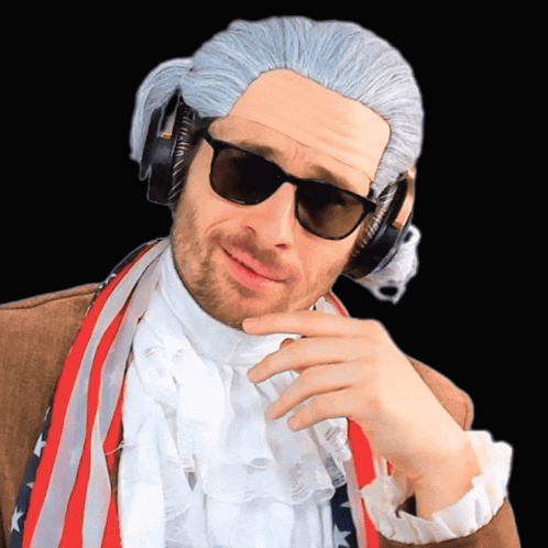 A Man Wearing A Wig And Sunglasses Has Headphones On GIF