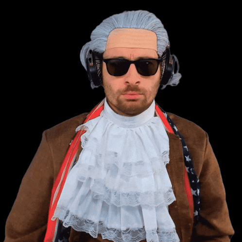 A Man Wearing A Wig And Sunglasses Has Headphones On His Ears GIF