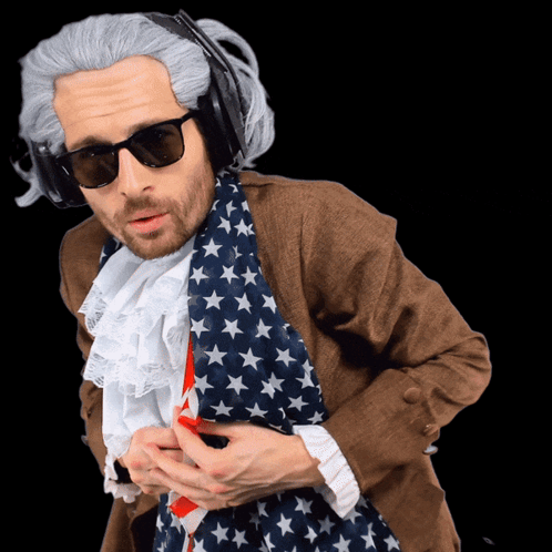 A Man Wearing A Wig And Sunglasses Has Headphones On His Head GIF