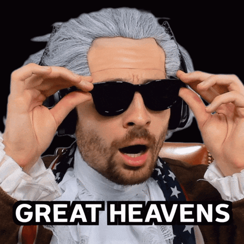 A Man Wearing A Wig And Sunglasses Has The Words Great Heavens Above His Head GIF