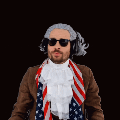 A Man Wearing A Wig And Sunglasses Is Singing " Praise The Lord " GIF