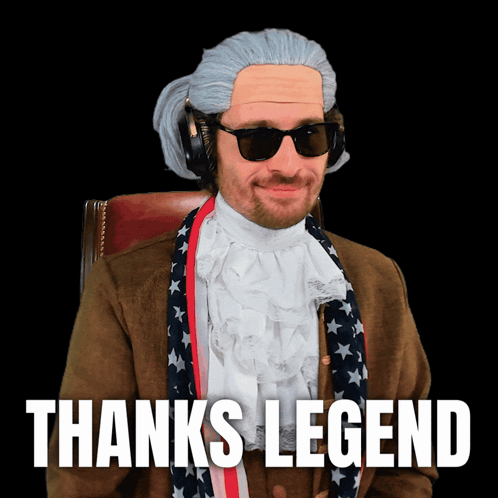 A Man Wearing A Wig And Sunglasses Is Sitting In A Chair And Says Thanks Legend GIF