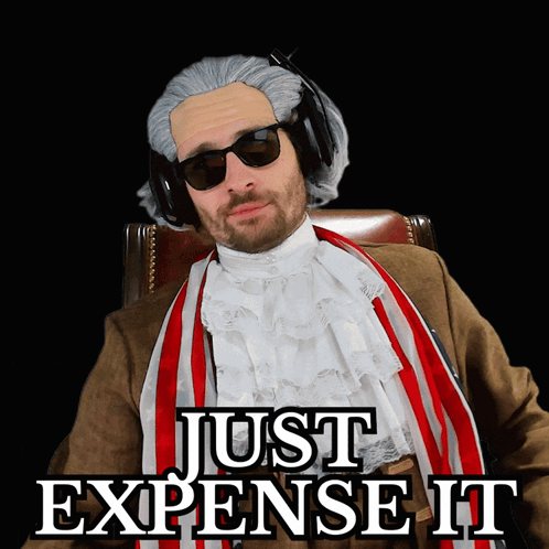 A Man Wearing A Wig And Sunglasses Is Sitting In A Chair With The Words Just Expense It Above Him GIF